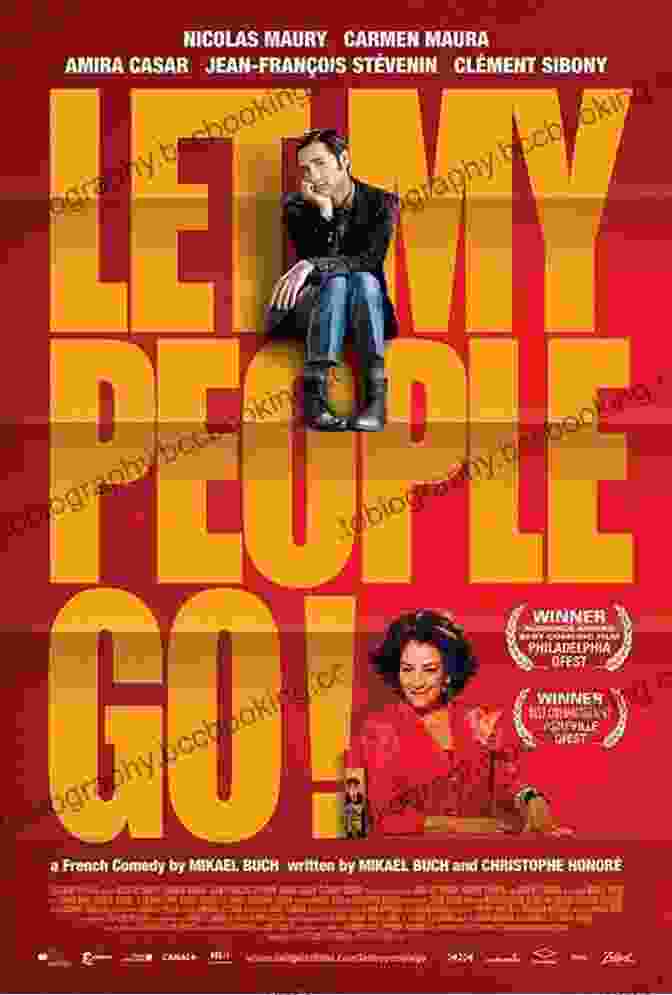 A Group Of People Holding Up Copies Of Let My People Go Let My People Go Barnaby Phillips