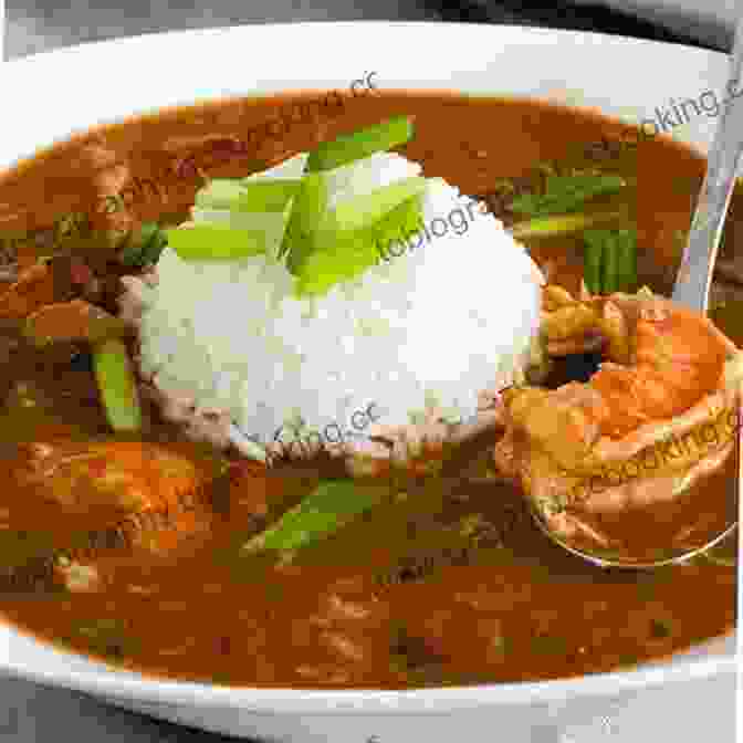 A Steaming Bowl Of Gumbo, With Its Enticing Blend Of Vegetables, Seafood, And The Iconic Roux. Cajun Cookbook: Discover The Heart Of Southern Cooking With Delicious Cajun Recipes