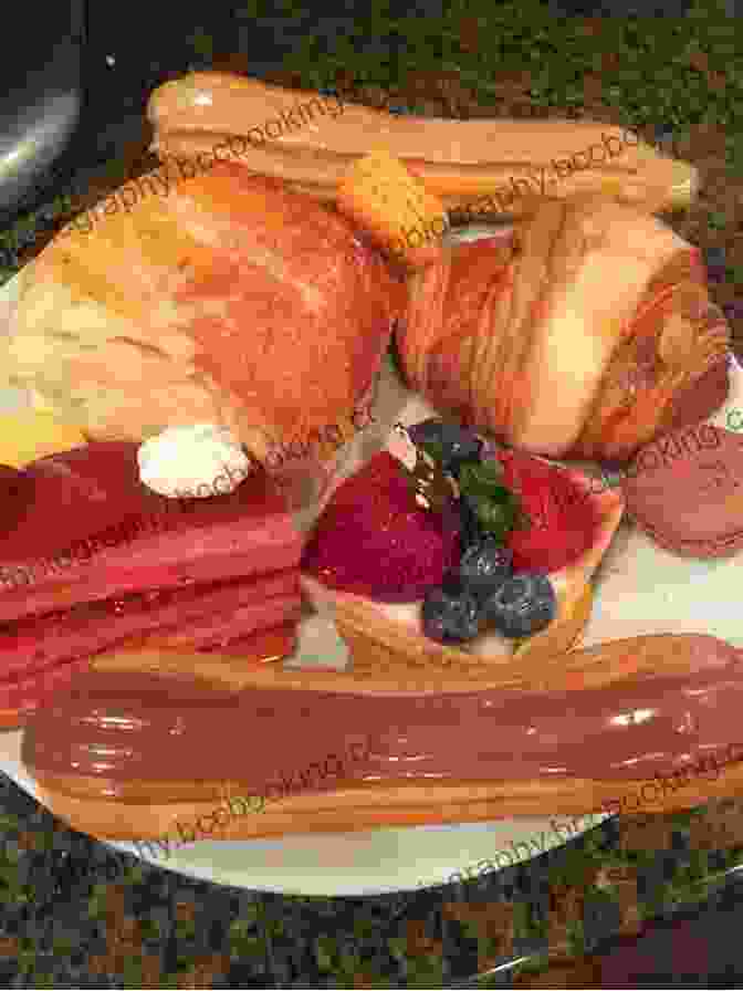 A Tantalizing Platter Of Assorted French Pastries, Including Croissants, Eclairs, Macarons, And Fruit Tarts Desserts Of The Parisians : An Exciting Collection Of Simple Desserts From French Home Cooks And Chefs