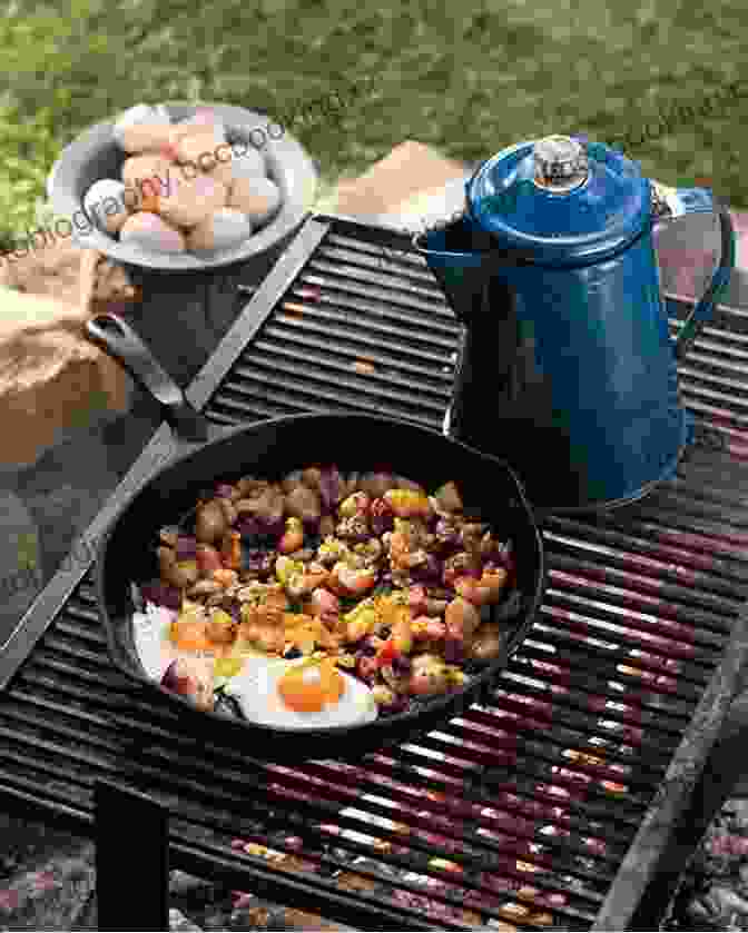 Camping Stove Cooking Eggs And Bacon 100 Easy Camping Recipes (Camping Books)