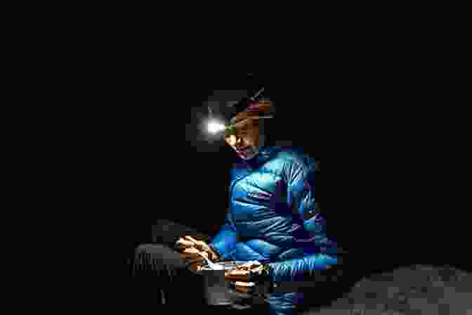 Person Using A Headlamp While Navigating At Night Be Expert With Map And Compass