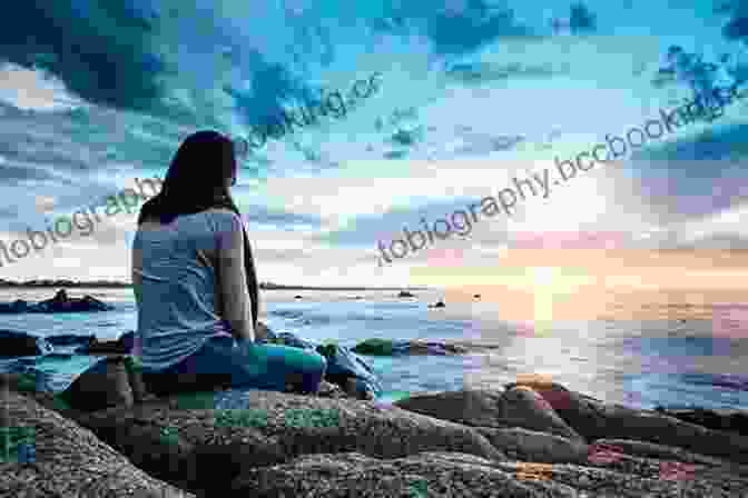 Teenager Sitting On A Rock, Looking Out At A Beautiful Sunset, Symbolizing The Freedom And Peace That Comes With Acceptance. Stuff That Sucks: A Teen S Guide To Accepting What You Can T Change And Committing To What You Can (The Instant Help Solutions Series)